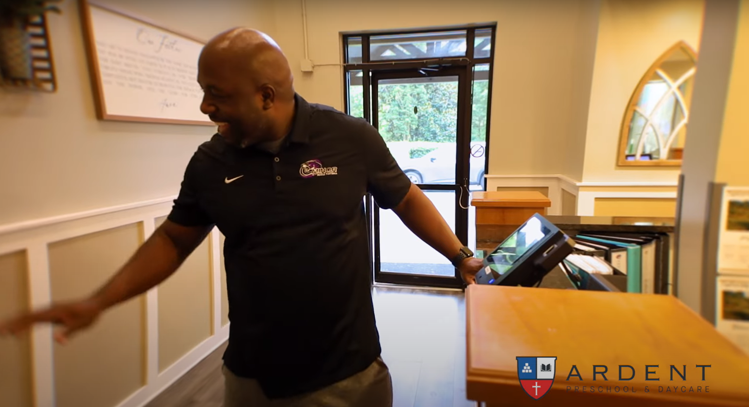 arent checking out child with biometric system at Ardent Daycare – Hoover’s Trace Crossings campus. Click to view delighted parent video testimonial.
