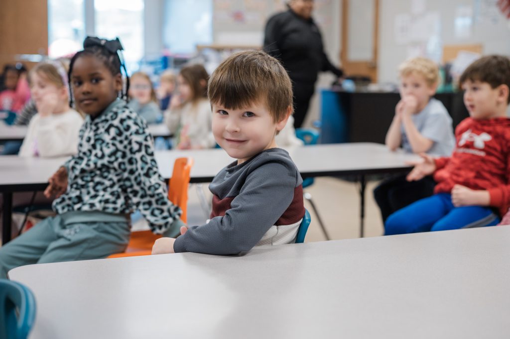 Preschool and kindergarten students at Ardent Preschool & Daycare engaged in class time, building early literacy and academic skills in a nurturing, faith-based environment.